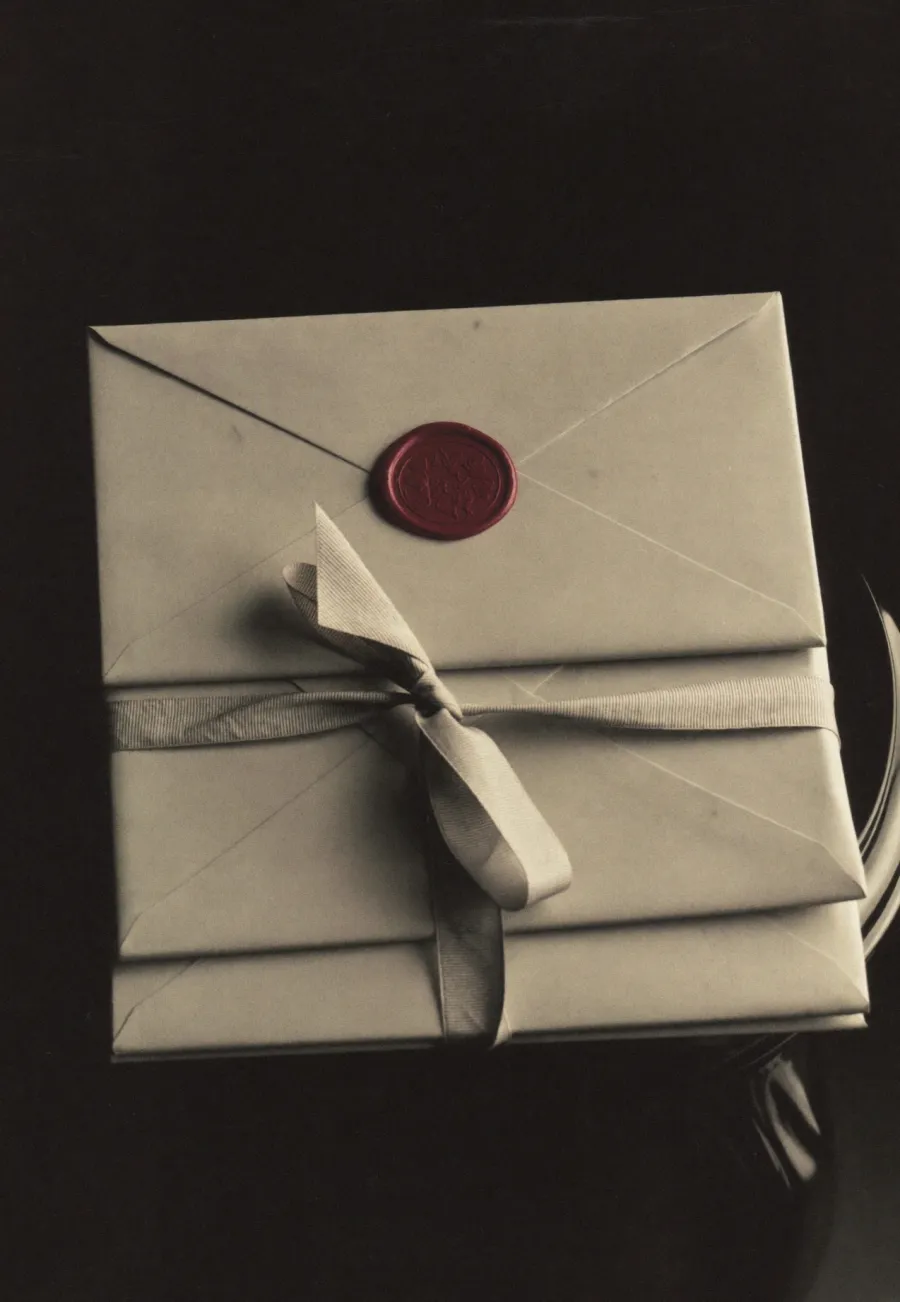 Letters tied with ribbon and sealed in wax